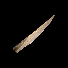Figure 12, left: A flint burin, Late Magdalenian, about 12,500 years old from the rock shelter of La Madeleine. A burin is a common Stone Age tool which could be held like a pencil. They were used for drawing but also for cutting out pieces of bone and antler, which were then made into everyday items such as needles, fish hooks, harpoon and spear tips and jewellery.